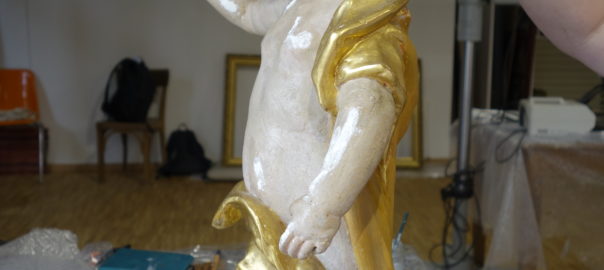 Putte wird vergoldet